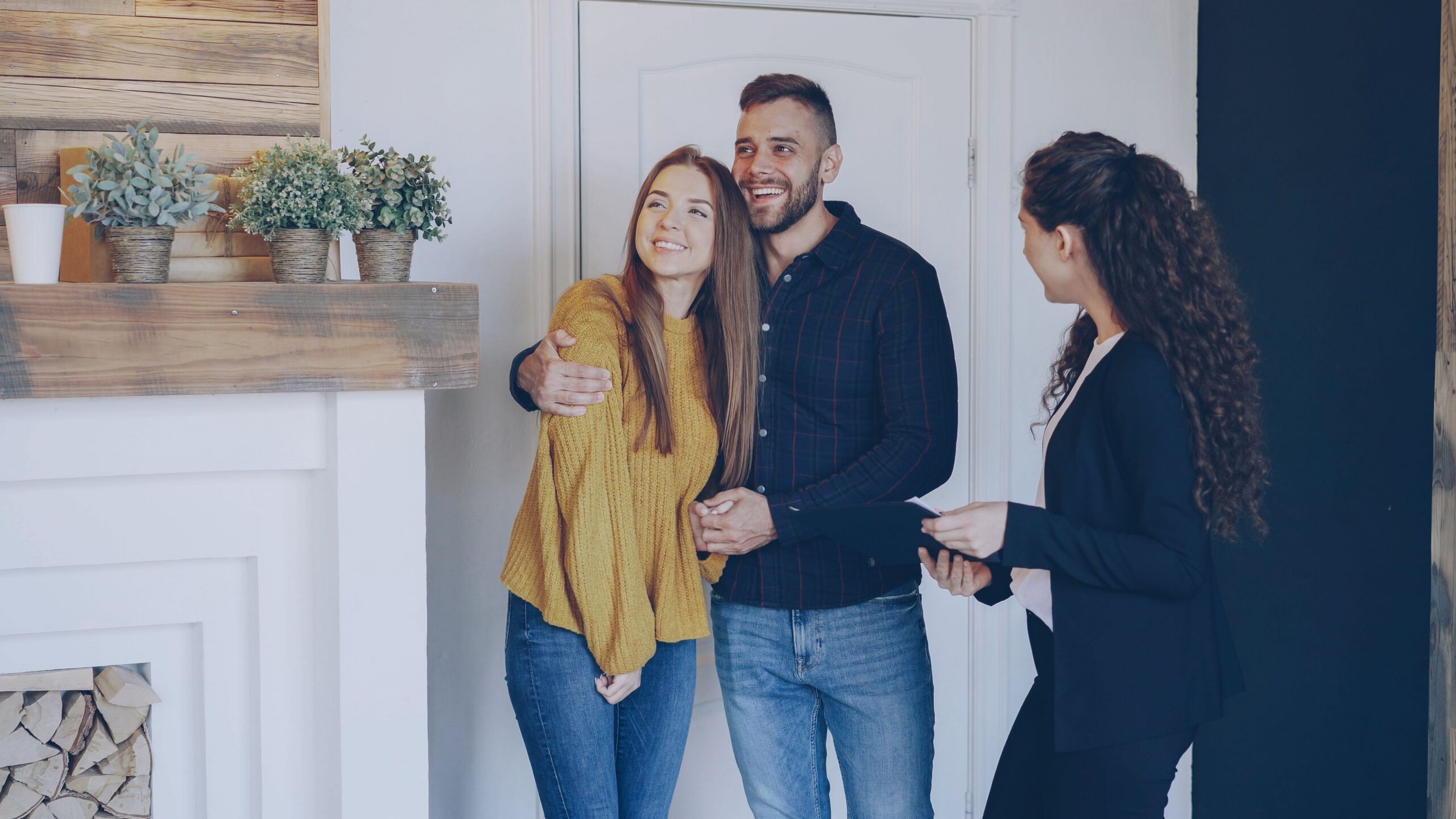 Couple shopping for homes with their realtor